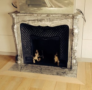 Pose de cheminée à Paris. Modèle Pompadour avec intérieur en fonte